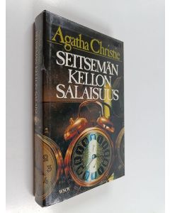 Kirjailijan Agatha Christie käytetty kirja Seitsemän kellon salaisuus