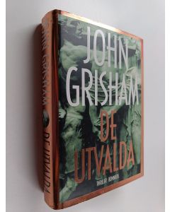 Kirjailijan John Grisham käytetty kirja De utvalda