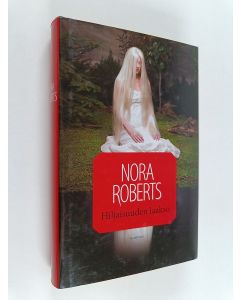 Kirjailijan Nora Roberts käytetty kirja Hiljaisuuden laakso