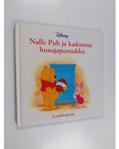 Kirjailijan Kathleen W. Zoehfeld käytetty kirja Nalle Puh ja kadonnut hunajapurnukka : luukkukirja