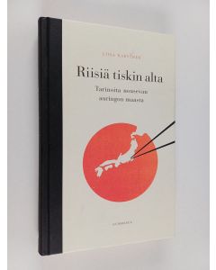 Kirjailijan Liisa Karvinen käytetty kirja Riisiä tiskin alta : tarinoita nousevan auringon maasta