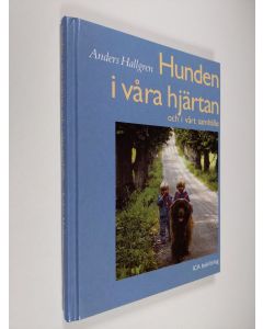 Kirjailijan Anders Hallgren käytetty kirja Hunden i våra hjärtan och i vårt samhälle