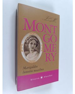 Kirjailijan L. M. Montgomery käytetty kirja Marigoldin lumottu maailma