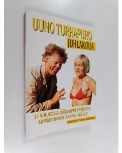 Tekijän Tuomas Marjamäki  käytetty kirja Uuno Turhapuro juhlakirja : 25 vuodessa jääkaapin varjosta kansakunnan kaapin päälle