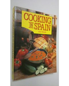 Kirjailijan Janet Mendel käytetty kirja Cooking in Spain