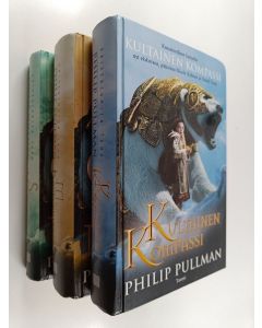 Kirjailijan Philip Pullman käytetty kirja Universumien tomu 1-3 : Kultainen kompassi ; Salaperäinen veitsi ; Maaginen kaukoputki
