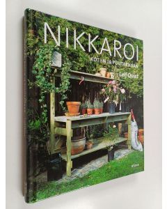 Kirjailijan Leif Qvist käytetty kirja Nikkaroi kotiin ja puutarhaan