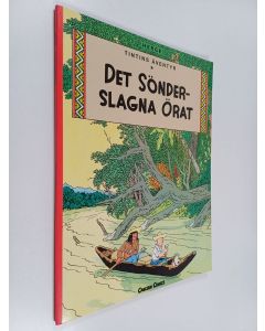 Kirjailijan Herge käytetty kirja Det sönderslagna örat