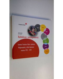 Kirjailijan Pirkko Annala käytetty kirja Kahdeksan vuosikymmentä : Suomen Punaisen Ristin toimintaa Pohjanmaalla ja Keski-Suomessa vuosina 1933-2013