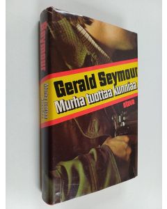 Kirjailijan Gerald Seymour käytetty kirja Murha tuottaa kunniaa