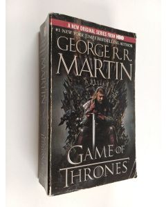 Kirjailijan George R. R. Martin käytetty kirja A game of thrones : Book one of A song of ice and fire