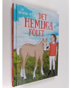 Kirjailijan Amanda Wills käytetty kirja Det hemliga fölet