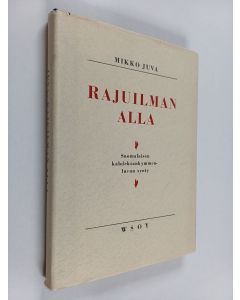 Kirjailijan Mikko Juva käytetty kirja Rajuilman alla : suomalaisen kahdeksankymmenluvun synty
