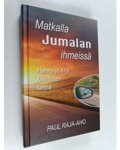 Kirjailijan Paul Raja-aho käytetty kirja Matkalla Jumalan ihmeissä : Hannu ja Arja Mehtosen tarina