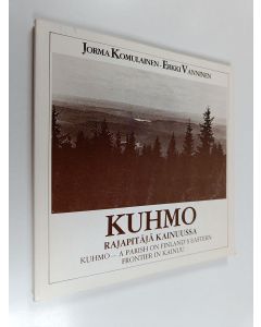 Kirjailijan Jorma Komulainen & Erkki Vanninen käytetty kirja Kuhmo - Rajapitäjä Kainuussa = A parish on Finland's eastern frontier in Kainuu