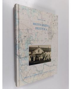 Kirjailijan Väinö Komu käytetty kirja Heittopelto Heittola : talon ja suurperheen vaiheet 1836-1932