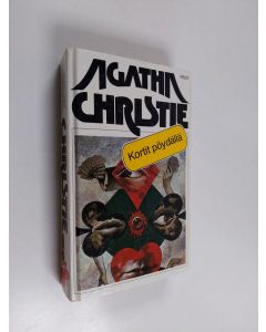 Kirjailijan Agatha Christie käytetty kirja Kortit pöydällä ; Syyttävä sormi (yhteisnide)