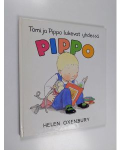 Kirjailijan Helen Oxenbury käytetty kirja Tomi ja Pippo lukevat yhdessä
