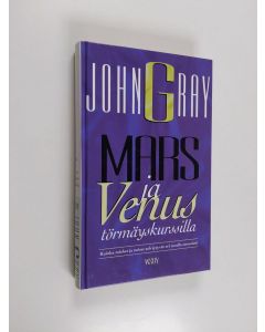 Kirjailijan John Gray käytetty kirja Mars ja Venus törmäyskurssilla : kuinka miehet ja naiset selviytyvät eri tavalla stressistä