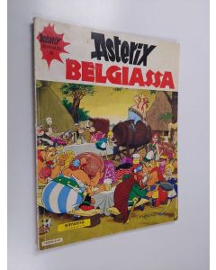 Kirjailijan Rene Goscinny käytetty kirja Asterix seikkailee 24 : Asterix Belgiassa