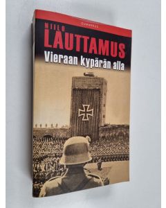 Kirjailijan Niilo Lauttamus käytetty kirja Vieraan kypärän alla