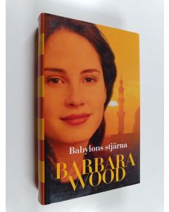 Kirjailijan Barbara Wood käytetty kirja Babylons stjärna