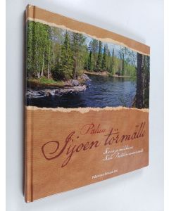 Kirjailijan Pekka Väisänen käytetty kirja Paluu Iijoen törmälle : kuvia ja mielikuvia Kalle Päätalon sanavirrasta