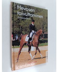 Kirjailijan Guillaume Henry käytetty kirja Hevosen taivuttaminen