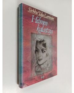 Kirjailijan Sirkku Talja-Larrivoire käytetty kirja Helmenkalastaja