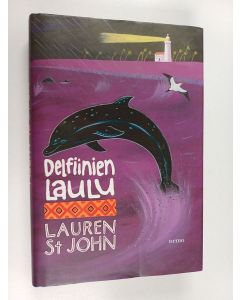 Kirjailijan Lauren St John käytetty kirja Delfiinien laulu