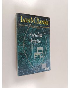 Kirjailijan Iain Banks käytetty kirja Aseiden käyttö