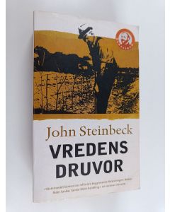 Kirjailijan John Steinbeck käytetty kirja Vredens druvor