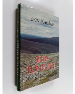 Kirjailijan Leevi Karsikas käytetty kirja Seitatunturit : eräkertomuksia