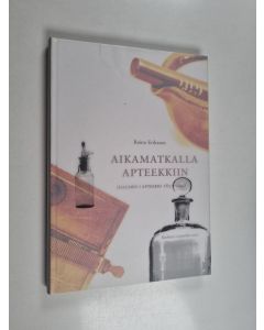 Kirjailijan Reino Eriksson käytetty kirja Aikamatkalla apteekkiin : Iisalmen I apteekki 1857-2007