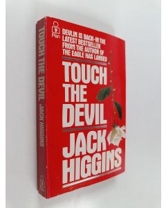 Kirjailijan Jack Higgins käytetty kirja Touch the Devil