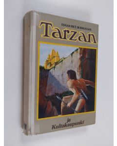 Kirjailijan Edgar Rice Burroughs käytetty kirja Tarzan ja kultakaupunki