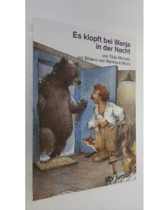 Kirjailijan Tilde Michels käytetty kirja Es klopft bei Wanja in der Nacht : eine Geschichte in Versen (UUDENVEROINEN)
