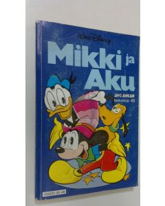 Kirjailijan Walt Disney käytetty kirja Mikki ja Aku
