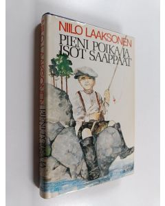 Kirjailijan Niilo Laaksonen käytetty kirja Pieni poika ja isot saappaat