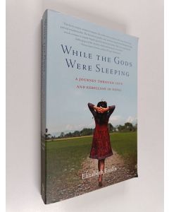 Kirjailijan Elizabeth Enslin käytetty kirja While the Gods Were Sleeping - A Journey Through Love and Rebellion in Nepal