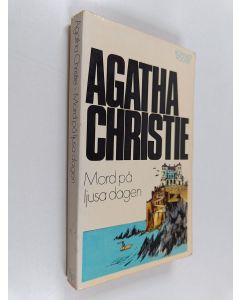Kirjailijan Agatha Christie käytetty kirja Mord på ljusa dagen