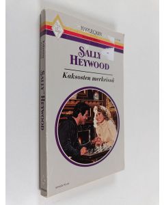 Kirjailijan Sally Heywood käytetty kirja Kaksosten merkeissä