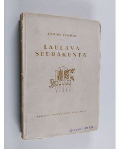 Kirjailijan Aarni Voipio käytetty kirja Laulava seurakunta