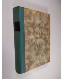 Kirjailijan Angus Wilson käytetty kirja Epäjumala haudassa