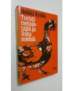 Kirjailijan Heikki Kytölä käytetty kirja Turistimetsästäjiä ja lintumiehiä