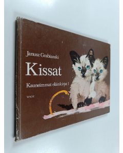 Kirjailijan Janusz Grabianski käytetty kirja Kissat