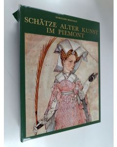 Kirjailijan Marziano Bernardi käytetty kirja Schätze alter Kunst im Piemont (Laatikossa)