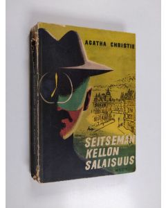 Kirjailijan Agatha Christie käytetty kirja Seitsemän kellon salaisuus