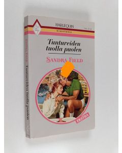 Kirjailijan Sandra Field käytetty kirja Tuntureiden tuolla puolen