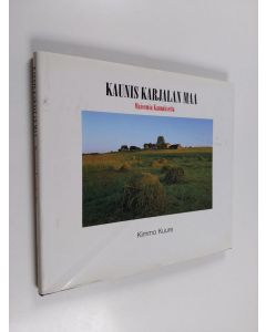 Kirjailijan Kimmo Kuure käytetty kirja Kaunis Karjalan maa : maisemia Kannakselta